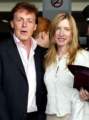 May 10 - McCartney and his wife Heather Mills arriving in Italy.jpg